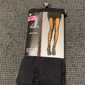 Black distressed tights. Perfect for fall and Halloween. Never used. One size.